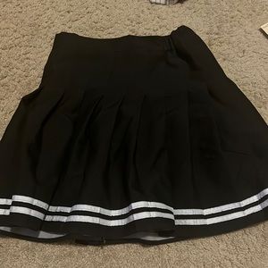 black and white skirt with shorts inside! says size L but fits more like a M